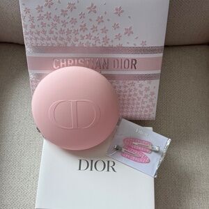 New Dior pink pouch with an Dior pouch and Dior pink hair clips